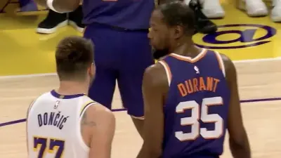 Luka Doncic and Kevin Durant talking on the court