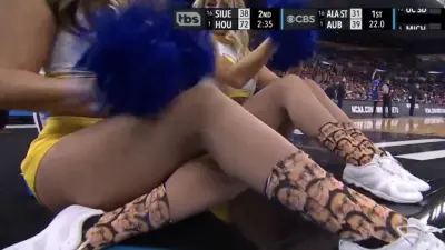 McNeese cheerleaders wore socks with Amir Khan on them