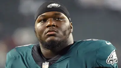 Milton Williams looks on