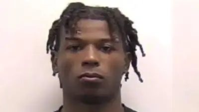 Nitro Tuggle poses for a mugshot