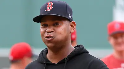Rafael Devers looks on