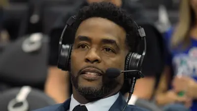 Chris Webber with a headset on
