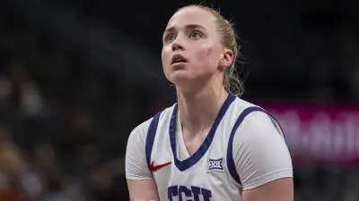 Hailey Van Lith holds a ball