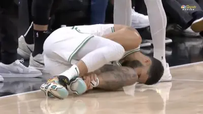 Celtics star Jayson Tatum in pain after suffering an ankle injury