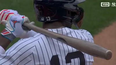 Jazz Chisholm Jr holds a bat