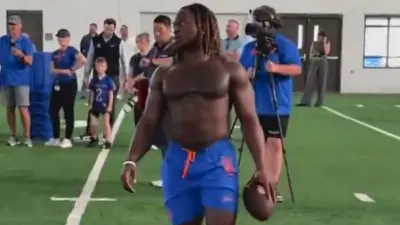 Jeanty holds a ball