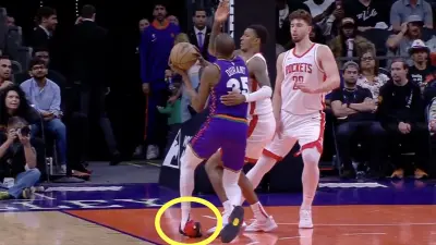 Kevin Durant twists his ankle during a Rockets-Suns game