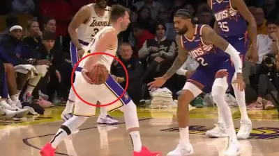 Luka Doncic committing a palming violation