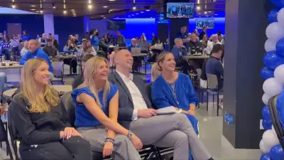Mark Pope laughing
