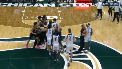Michigan and Michigan State basketball fight
