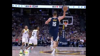 Nuggets star Nikola Jokic heaving a shot