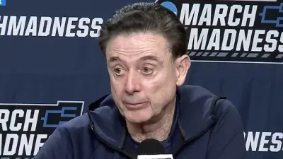 Rick Pitino with an angry look on his face