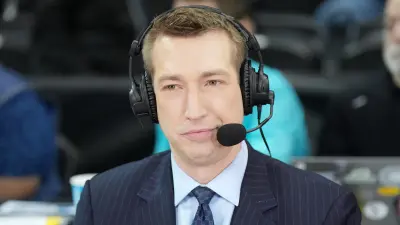 Robbie Hummel with a headset on