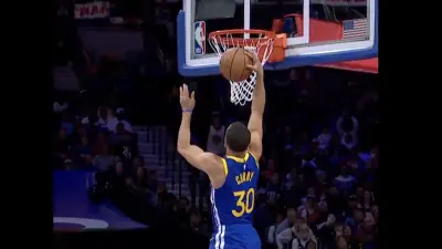 Warriors star Steph Curry rising for a dunk