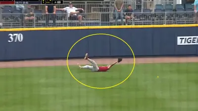 Tatum Marsh dives for a catch