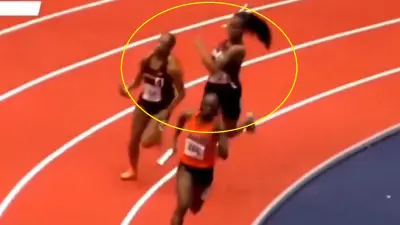 A woman swings a baton