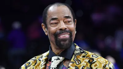 Walt Frazier in a suit