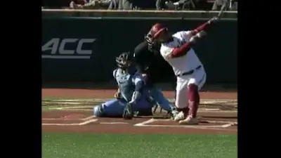 A batter swings at a pitch
