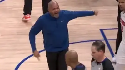 JB Bickerstaff yells at an official