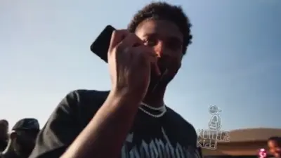 Shedeur Sanders takes a phone call