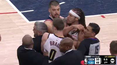 Aaron Gordon being held back