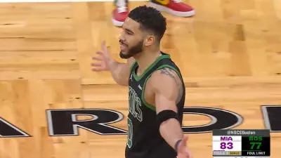 Jayson Tatum with his arms open