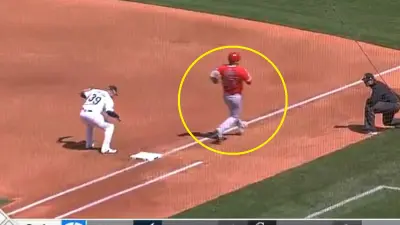 Mike Trout running down the first base line