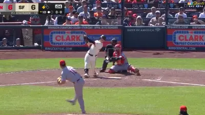 Mike Yastrzemski swings