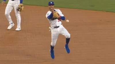 Mookie Betts throwing the ball