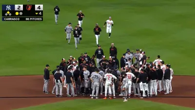 Orioles and Yankees players at second base