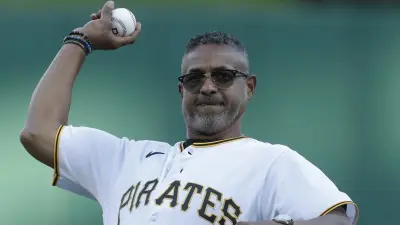 Roberto Clemente Jr. throwing out a pitch