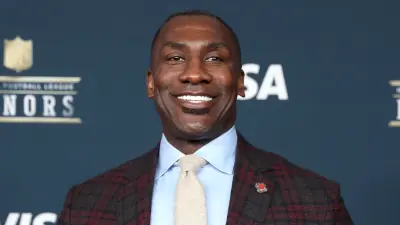Shannon Sharpe posting for a photo