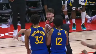 Trayce Jackson-Davis next to Alperen Sengun