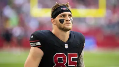 Trey McBride walking on the field