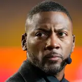 Ryan Clark looks on