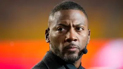 Ryan Clark looks on