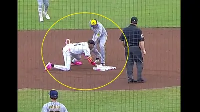 Chandler Simpson touches second base