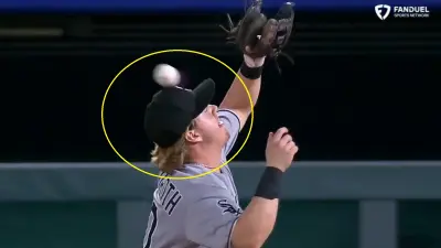 Chase Meidroth missing a pop fly