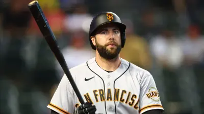 Darin Ruf holding a baseball bat