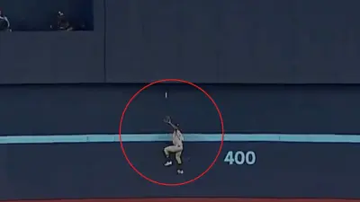 Denzel Clarke climbs the wall