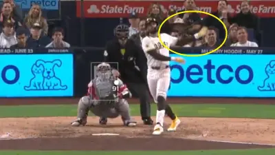 Fernando Tatis Jr flipping his bat