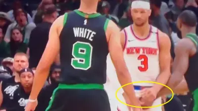 Jaylen Brown grabbing Josh Hart's nuts