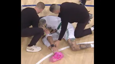 Celtics star Jayson Tatum on the floor with a leg injury