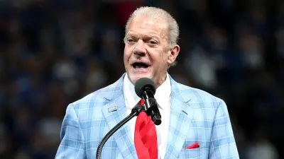 Jim Irsay speaking into a microphone