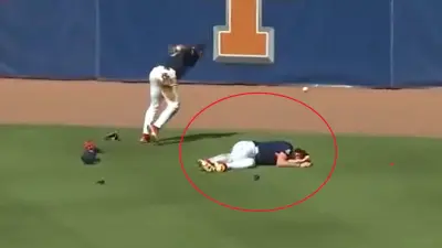 Ole Miss outfielder down after a collision