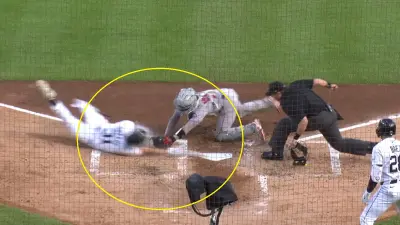 Riley Greene slides into home