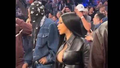 Stefon Diggs next to Cardi B