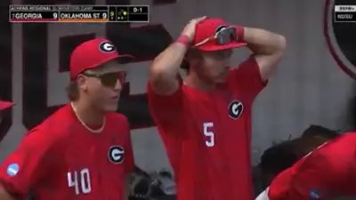 Georgia players look stunned in the dugout