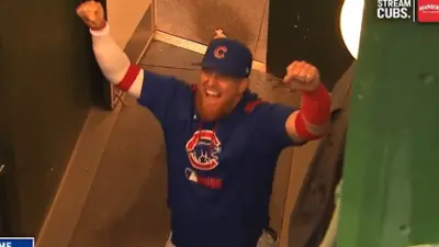 Justin Turner celebrates in the dugout