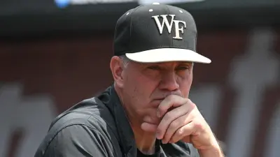 Tom Walter looks on from the dugout